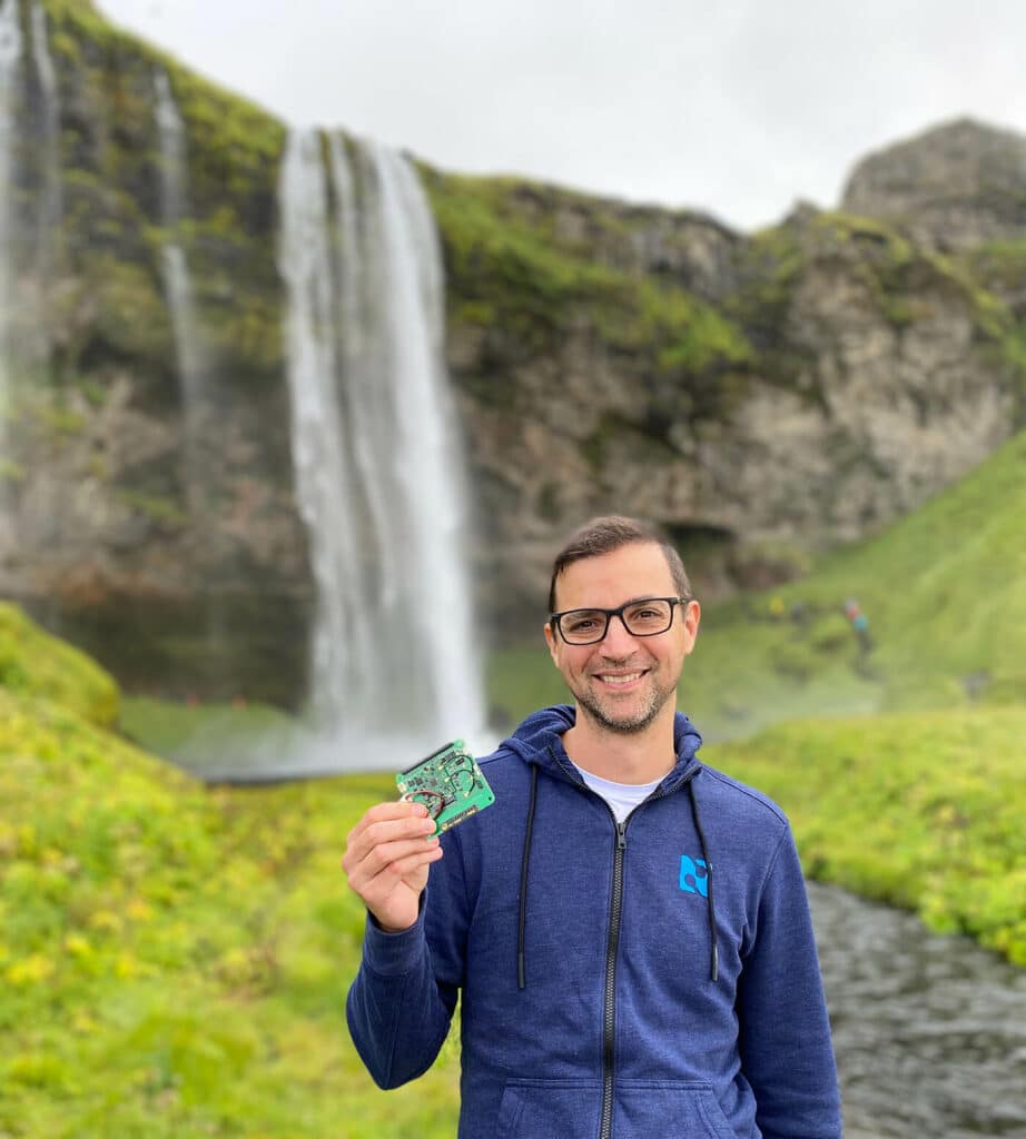notecard in front of waterfall