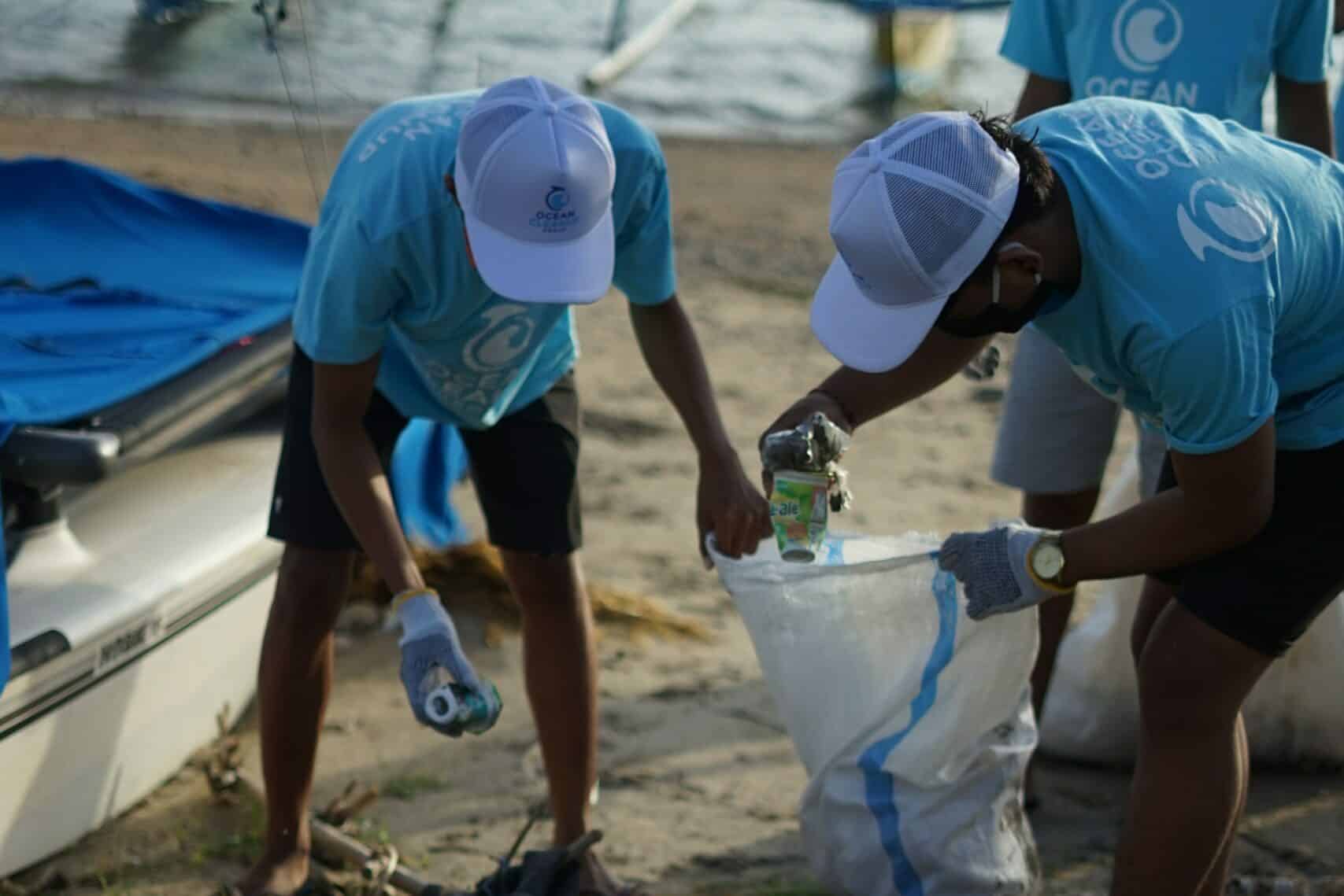 Team on beach in Indonesia cleaning trash